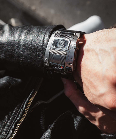 URWERK UR-111C Iron for sale, showcasing linear time indication, manual movement, and steel case. Certified pre-owned with 3 year URWERK warranty.