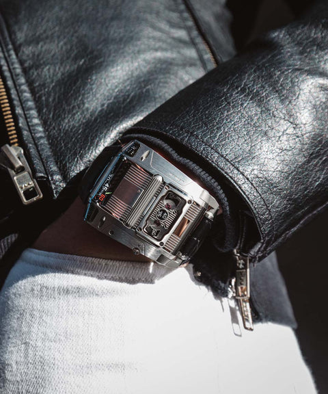 Explore the URWERK UR-111C Iron, a rare linear display watch with rotating cylinders and industrial steel case. Fully inspected and certified by URWERK.