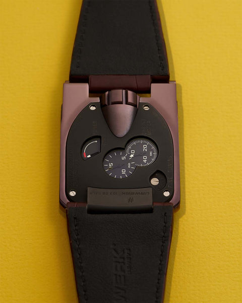 URWERK UR-103 TiAlN caseback showing control board and indicators.