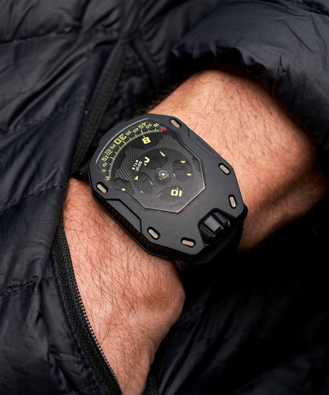 URWERK UR-105 TA All Black wrist shot showing matte finish and presence.