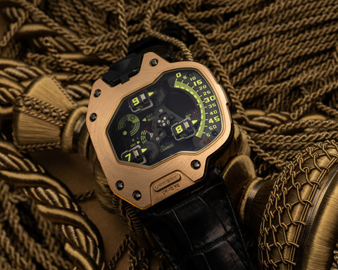 URWERK UR-110 Torpedo red gold watch with satellite time display and asymmetrical case.