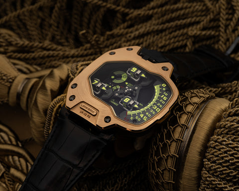 URWERK UR-110 red gold side profile highlighting sculptural asymmetrical design.