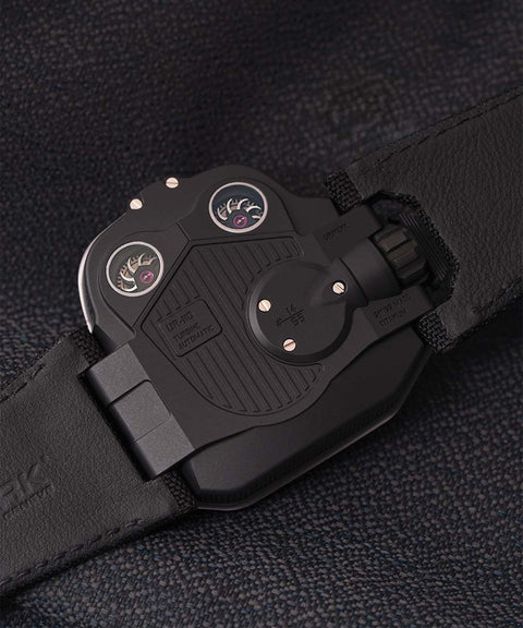 URWERK UR-110 TTH caseback showing twin turbine winding regulation system.