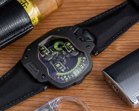 URWERK UR-110 ST steel ribbed bezel watch with rotating satellite torpedo hour display and futuristic case design.