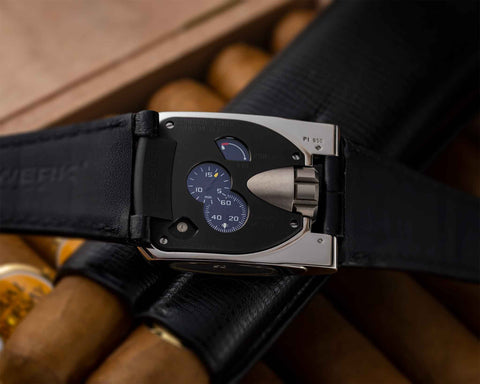 URWERK UR-103.05 platinum caseback featuring titanium control board with power reserve and fine tuning screw.