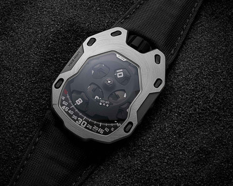 URWERK UR-105 M Iron Knight limited to 77 pieces in steel and titanium with satellite time display, PEEK canopy, and control board, available at UR-LEGENDS.