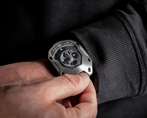 URWERK UR-105 M Iron Knight with satellite time display, iron shield case, and control board with service indicator, rare independent watch from UR-LEGENDS.