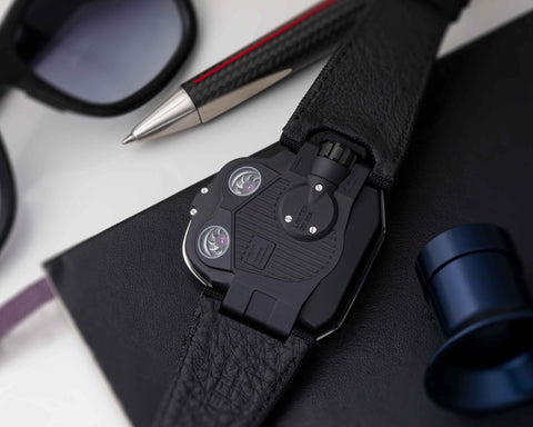 URWERK UR-110 PT platinum bezel detail with satin finishing and contrasting titanium case.