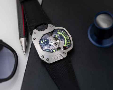 URWERK UR-110 PT platinum bezel watch with satellite torpedo hour display and asymmetrical case design.