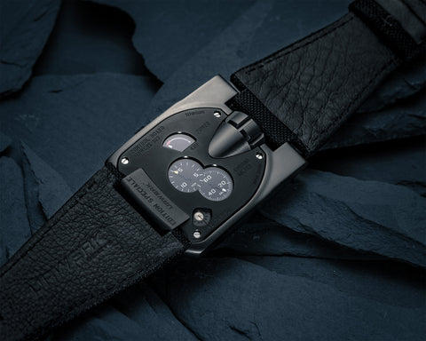 URWERK UR-103.09 caseback featuring control board with power reserve and precision adjustment screw.