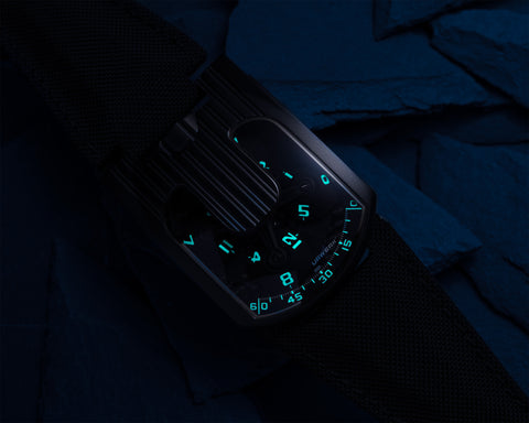 URWERK UR-103.09 collector watch with black steel case and satellite complication with bright lume.