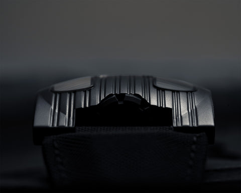 URWERK UR-103.09 AlTiN case with asymmetrical design and stealth matte black finish.
