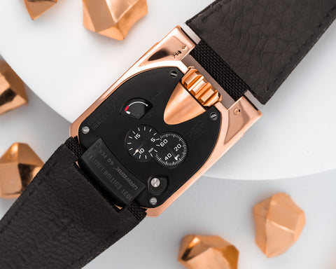 URWERK UR-103T red gold caseback featuring control board with power reserve and fine tuning screw.