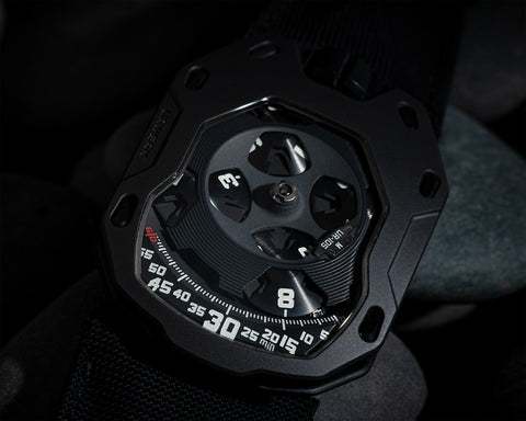 URWERK UR-105 Dark Knight wristwatch showing architectural case design and satellite time display.