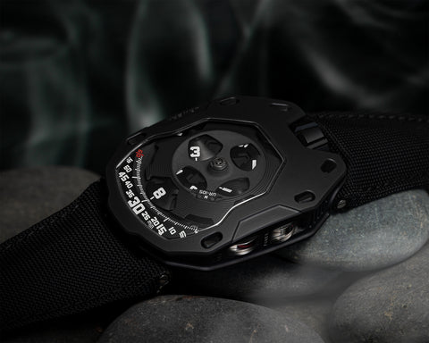 URWERK UR-105 M Dark Knight black AlTiN coated steel watch with satellite time display and shield case.