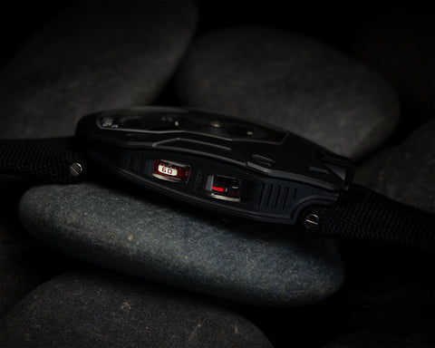 URWERK UR-105 M Dark Knight side profile showing power reserve indicator and running seconds display.