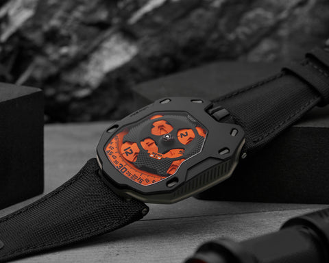 URWERK UR-105 TA Black Orange watch with satellite time display and orange accents.