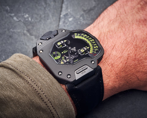 URWERK UR-110 ST Ribbed dial showing three rotating hour satellites on vertical arc.