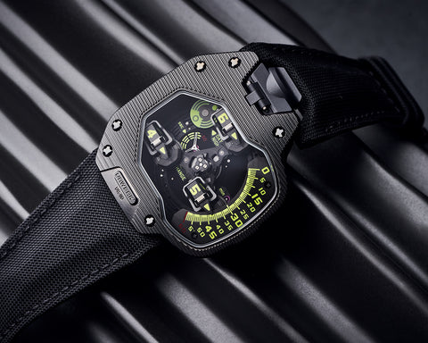 URWERK UR-110 ST Ribbed watch with satellite time display and textured case.